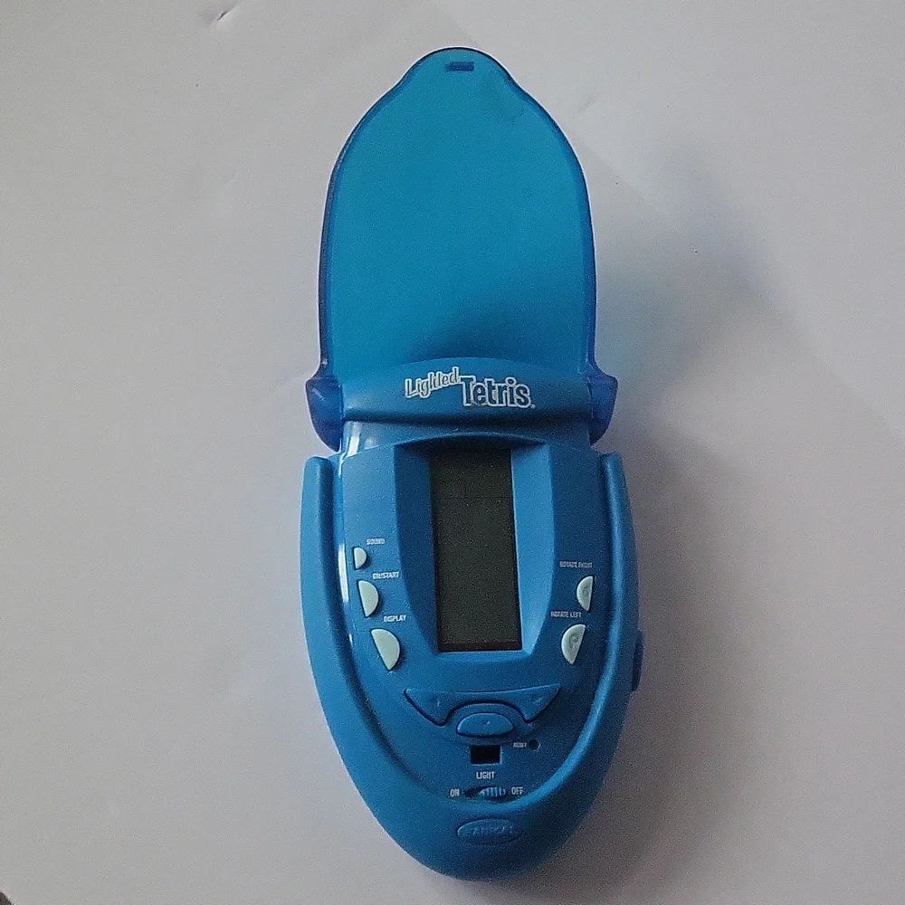 Tetris Lighted Electronic Handheld Travel Game Radica Fliptop Blue 2004 RADICA